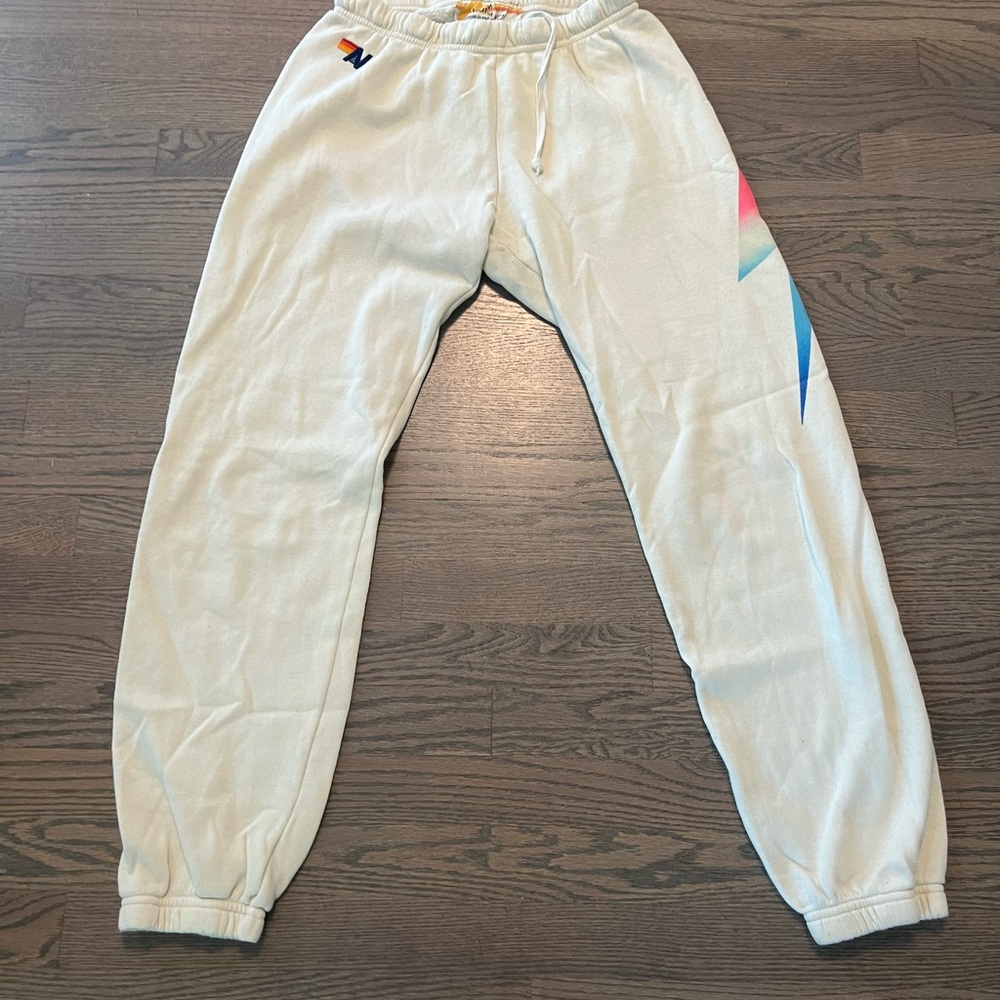 Aviator Nation sweatpants in sand, size medium. Lightning bolt on left side.